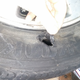 The ‘95 Accord slid into a curb and blew out the tire.